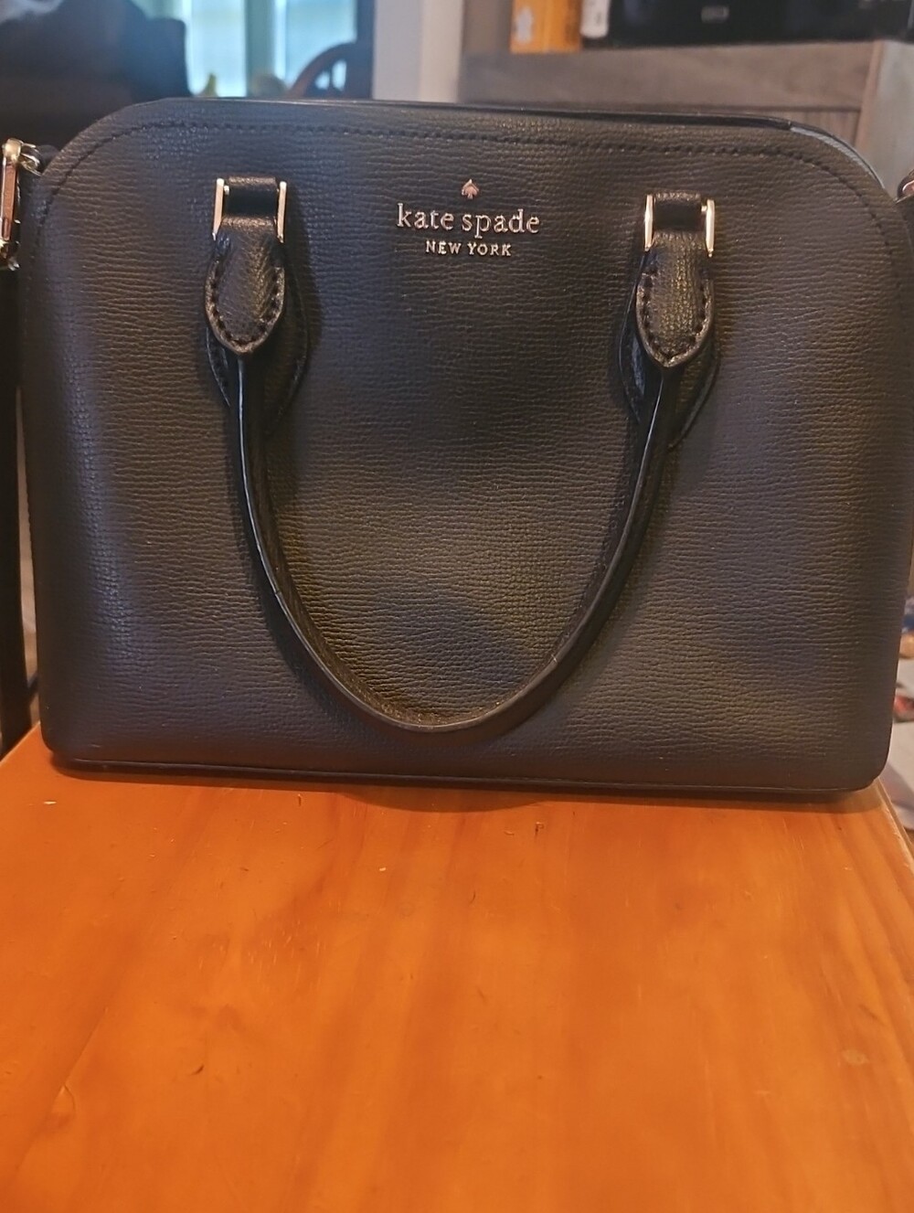 kate spade black leather satchel with gold-tone hardware